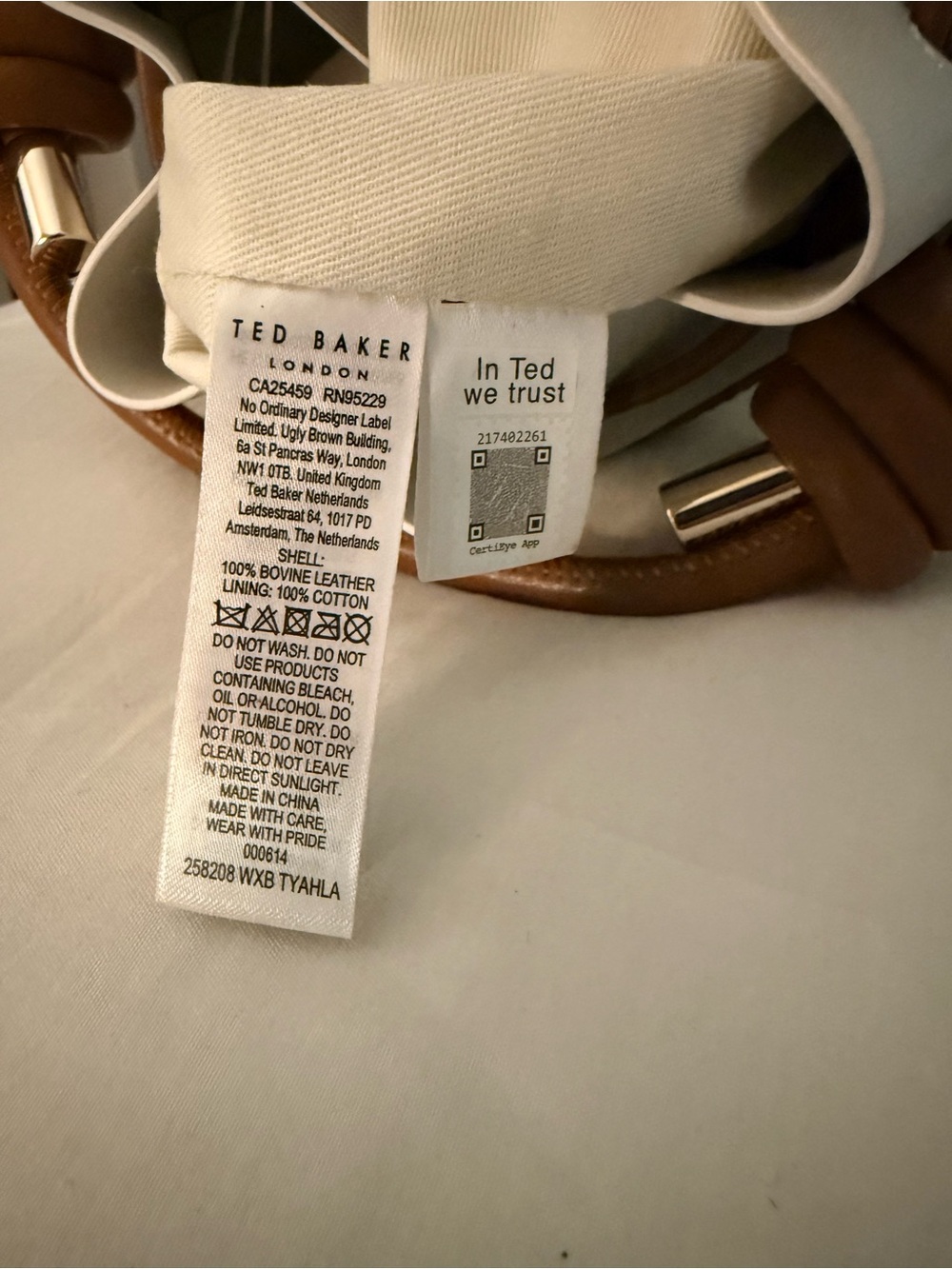 Ted Baker Cream & Tan Laser Cut Leather Floral Drawstring Mini Bucket Bag NWT - Picture 6 of 7